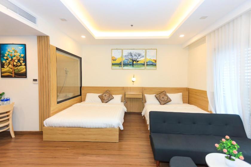 Phòng Tiêu Chuẩn 2 Giường Đơn Với Ghế Sofa