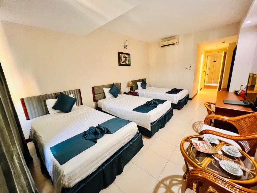 Phòng Deluxe cho 3 Người Phòng Deluxe cho 3 Người