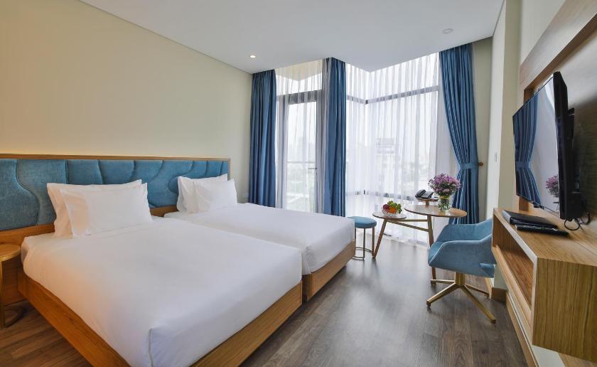 Phòng Deluxe 2 Giường Đơn Với Ban Công Nhìn Ra Thành Phố Phòng Deluxe 2 Giường Đơn Với Ban Công Nhìn Ra Thành Phố