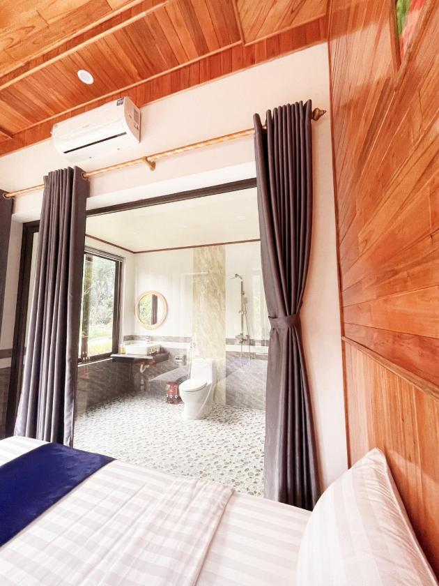 Phòng Giường đôi Deluxe (2 Người lớn + 1 Trẻ em)