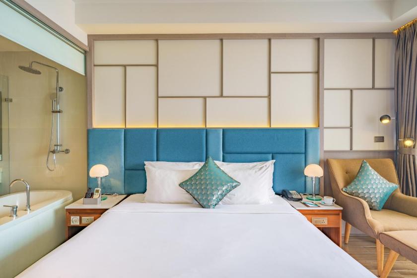 Phòng Premier Deluxe có Giường cỡ King và tầm nhìn ra Thành phố Phòng Premier Deluxe có Giường cỡ King và tầm nhìn ra Thành phố