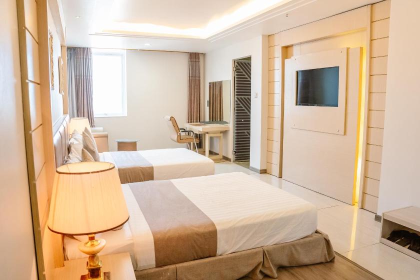 Phòng Deluxe thông nhau qua cửa nối Nhìn ra Sông của Thành phố