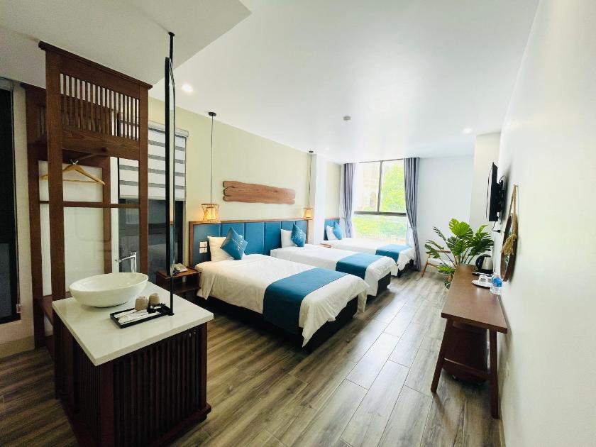 Phòng Deluxe cho 3 Người Phòng Deluxe cho 3 Người