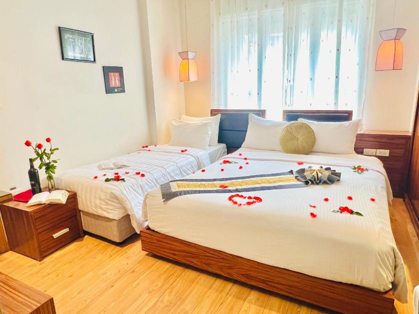 Phòng Deluxe cho 3 Người Phòng Deluxe cho 3 Người