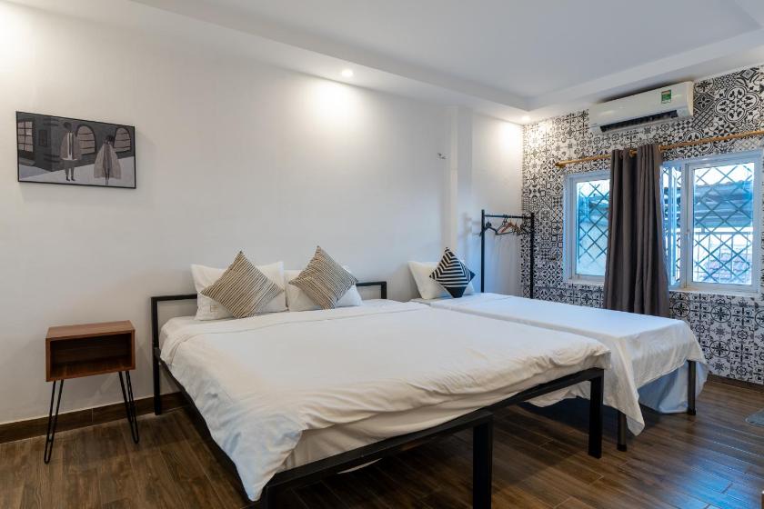 Phòng Deluxe cho 3 Người Phòng Deluxe cho 3 Người