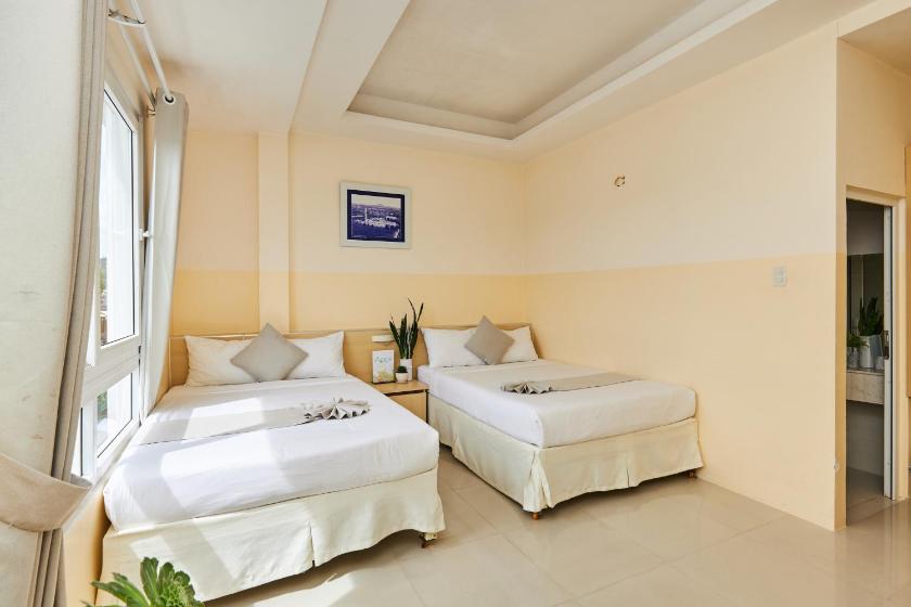 Phòng Deluxe 4 Người Nhìn Ra Thành Phố Phòng Deluxe 4 Người Nhìn Ra Thành Phố