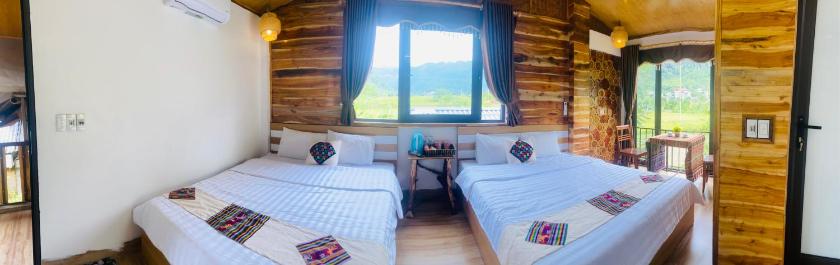 Phòng Giường đôi Deluxe (2 Người lớn + 1 Trẻ em)
