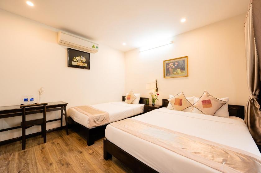 Phòng Deluxe cho 3 Người Phòng Deluxe cho 3 Người