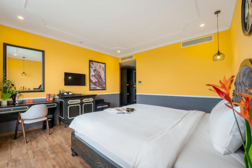 Phòng Deluxe Giường Đôi Với Ban Công và Tầm Nhìn Ra Biển Phòng Deluxe Giường Đôi Với Ban Công và Tầm Nhìn Ra Biển