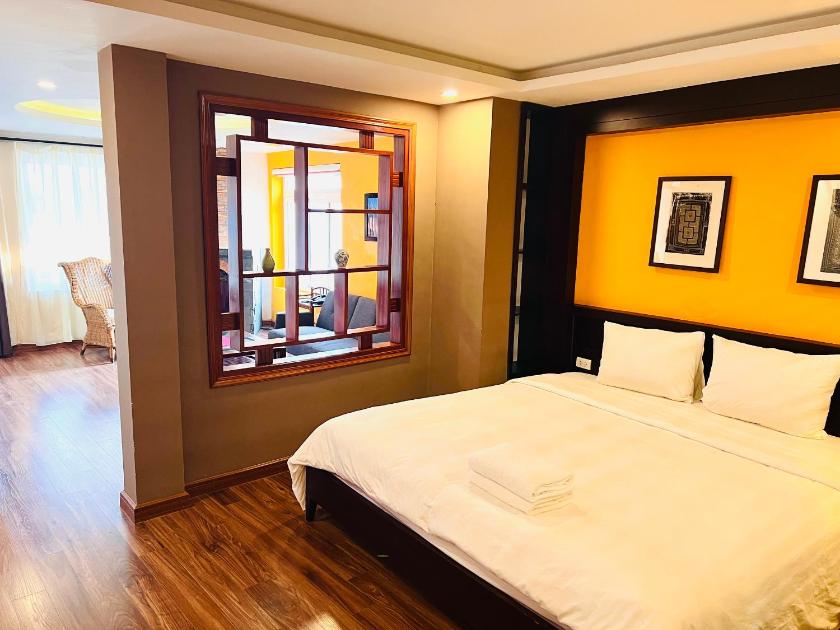 Phòng Deluxe (2 Người lớn + 1 Trẻ em)