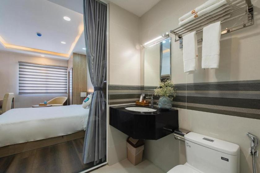 Phòng Giường đôi Deluxe (2 Người lớn + 1 Trẻ em)