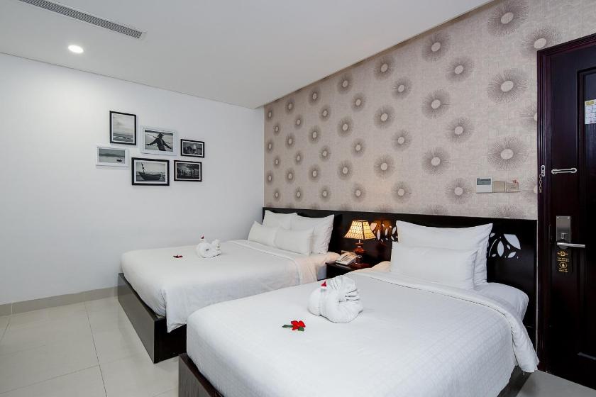 Phòng Deluxe cho 3 Người Phòng Deluxe cho 3 Người