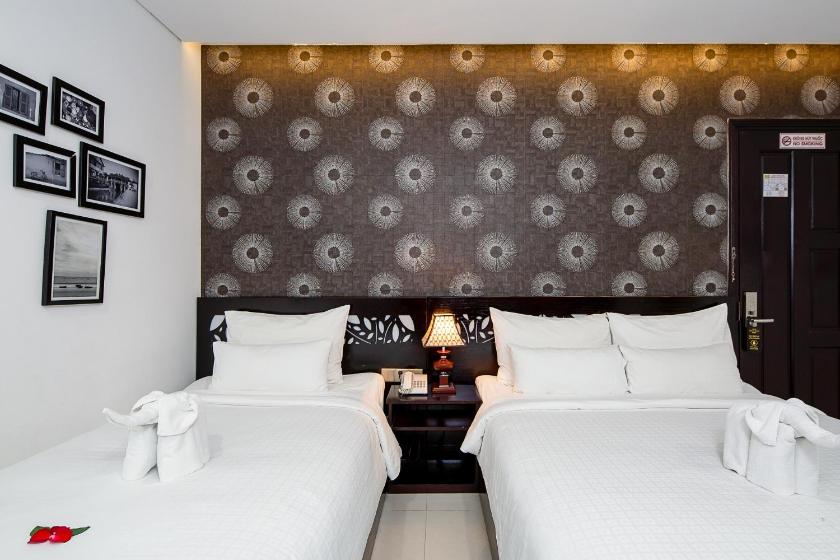 Phòng Deluxe cho 3 Người Phòng Deluxe cho 3 Người