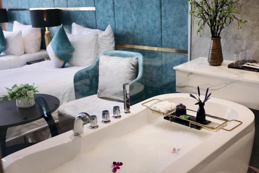 Phòng Premium Deluxe 2 Giường Đơn Nhìn Một Phần Ra Biển Phòng Premium Deluxe 2 Giường Đơn Nhìn Một Phần Ra Biển