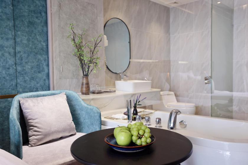 Phòng Premium Deluxe Giường Đôi Nhìn Một Phần Ra Biển Phòng Premium Deluxe Giường Đôi Nhìn Một Phần Ra Biển