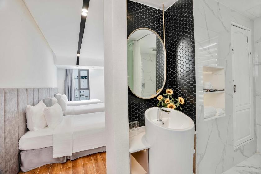 Phòng Deluxe cho 3 Người Phòng Deluxe cho 3 Người