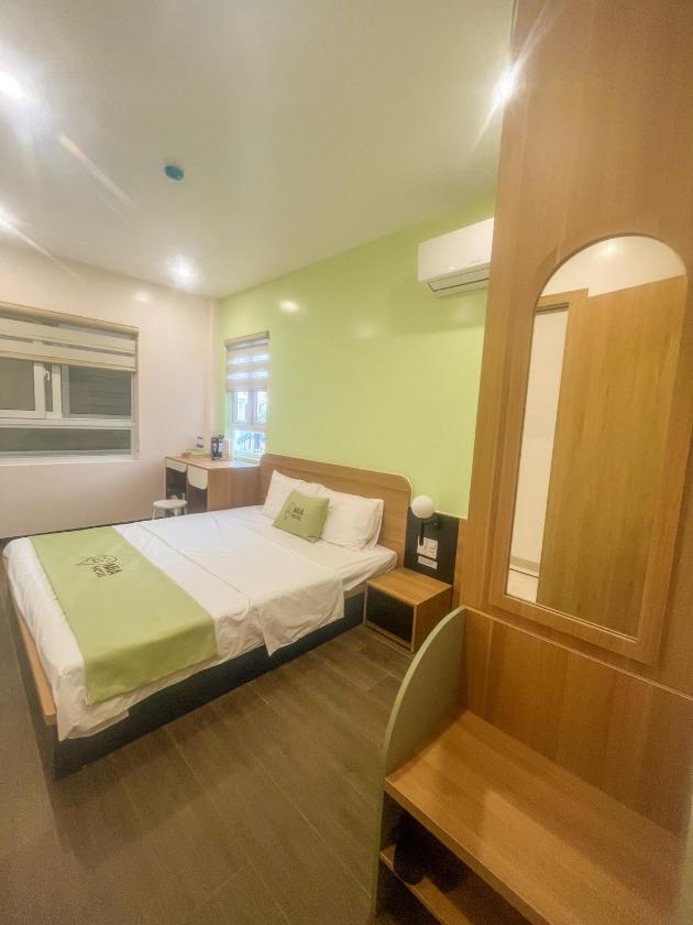 Phòng Giường đôi Deluxe (2 Người lớn + 1 Trẻ em)