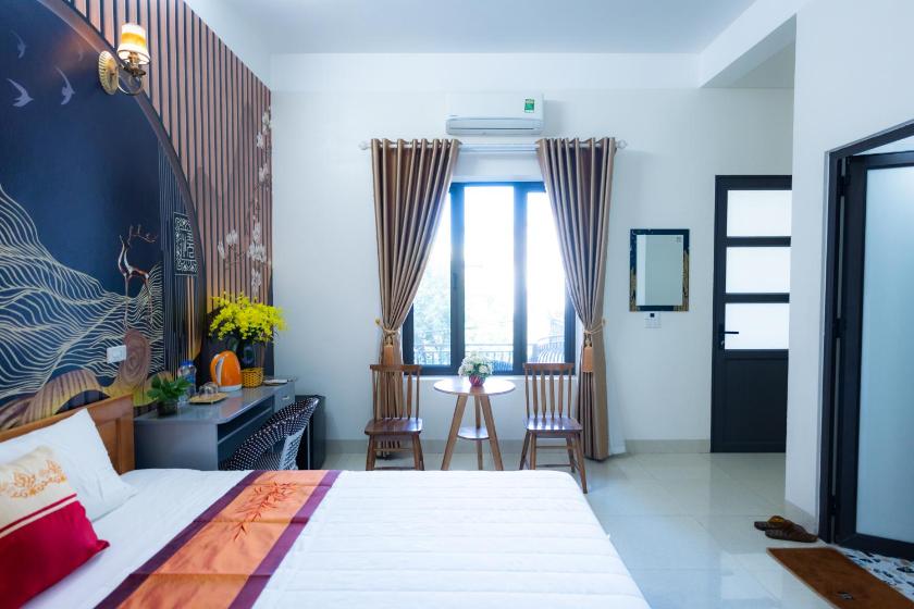 Phòng Giường đôi Deluxe (2 Người lớn + 1 Trẻ em)