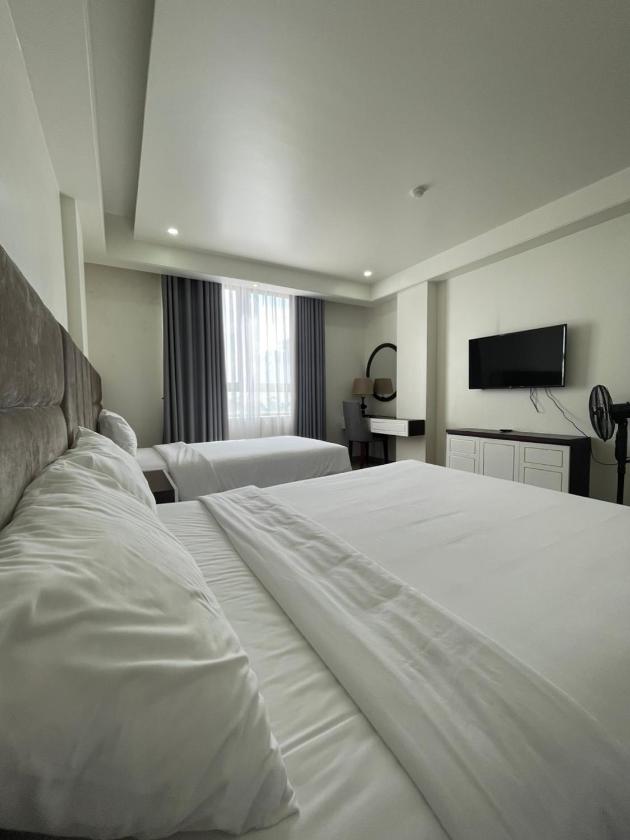 Phòng Deluxe cho 3 Người Phòng Deluxe cho 3 Người