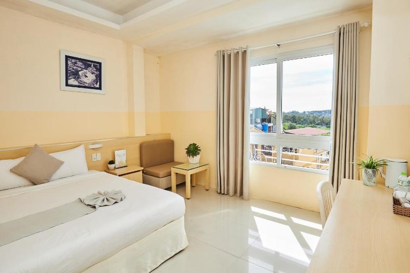 Phòng Giường đôi Deluxe (2 Người lớn + 1 Trẻ em) Phòng Giường đôi Deluxe (2 Người lớn + 1 Trẻ em)