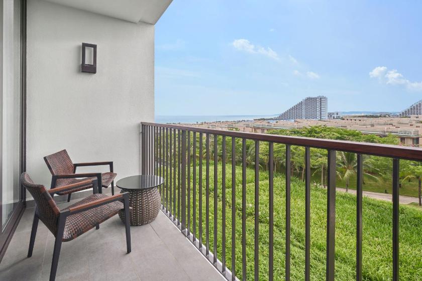 Deluxe Sea View with Two Double Beds and Balcony