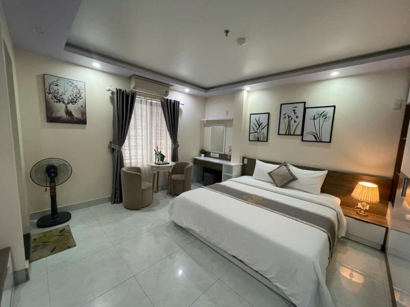 Phòng Deluxe (2 Người lớn + 1 Trẻ em) Phòng Deluxe (2 Người lớn + 1 Trẻ em)