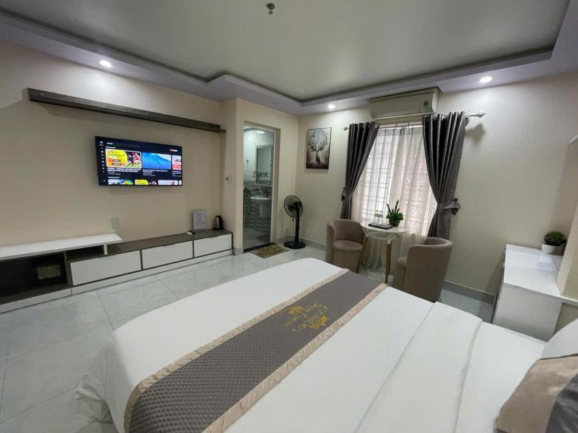 Phòng Deluxe (2 Người lớn + 1 Trẻ em) Phòng Deluxe (2 Người lớn + 1 Trẻ em)