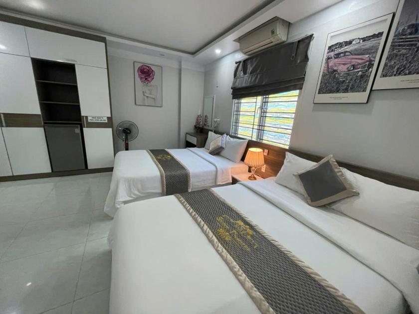 Phòng Deluxe Có 2 Giường Cỡ Queen Phòng Deluxe Có 2 Giường Cỡ Queen