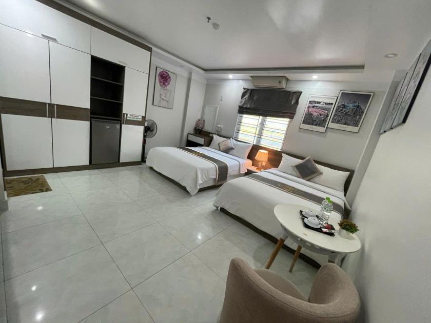 Phòng Deluxe Có 2 Giường Cỡ Queen Phòng Deluxe Có 2 Giường Cỡ Queen