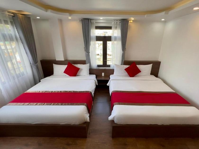 Phòng Deluxe Có 2 Giường Cỡ Queen Phòng Deluxe Có 2 Giường Cỡ Queen