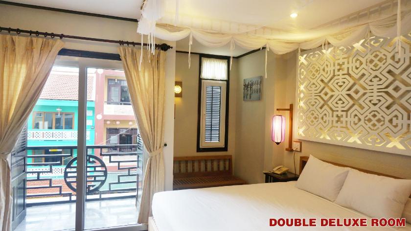 Phòng Deluxe Giường Đôi/2 Giường Đơn Có Cửa Sổ Và Ban Công
