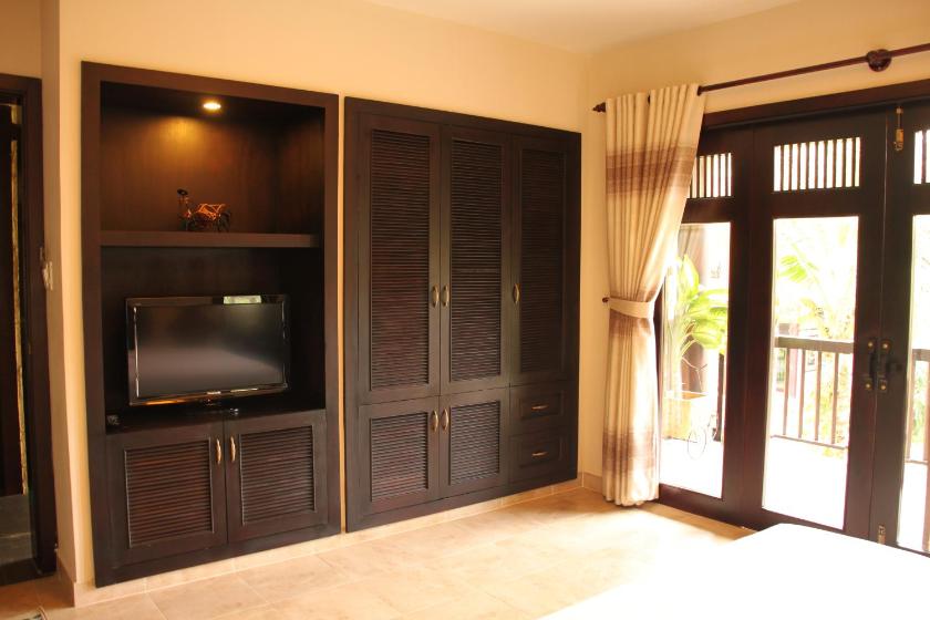 Phòng Deluxe Nhìn Ra Vườn - Phía Đồi Phòng Deluxe Nhìn Ra Vườn - Phía Đồi