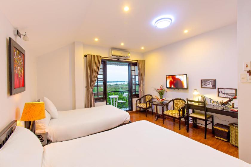Phòng Deluxe 2 Giường Đơn Nhìn Ra Sông Phòng Deluxe 2 Giường Đơn Nhìn Ra Sông