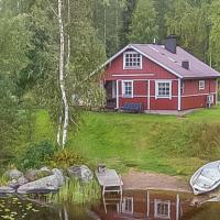 Holiday Home Tuomaantupa, rantalan lomamökit