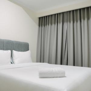 2BR Deluxe and Modern Menteng Park Apartment By Travelio