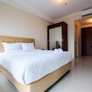 Simple Studio Signature Park Grande Apartment near MT Haryono By Travelio