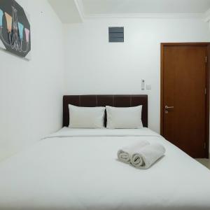 Cozy 2BR Signature Park Grande MT Haryono By Travelio