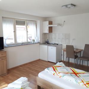 Gästehaus Apartments B & B27 und Pension Waldhorn
