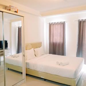Modern Studio at Signature Park Grande Apartment By Travelio