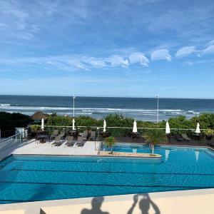 PÉ NA AREIA AGUAS DO SANTINHO