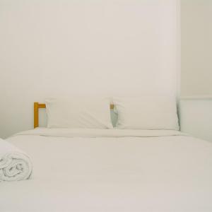 Minimalist Style 2BR Pakubuwono Terrace Apartment By Travelio