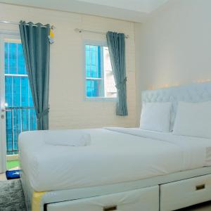 Cozy Studio with City View Signature Park Grande Apartment By Travelio