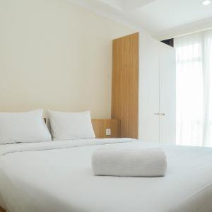 Minimalist and Comfy Studio at Menteng Park Apartment By Travelio