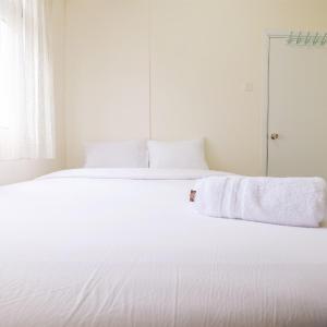 Cozy 2BR at 28th Floor Green Pramuka City Apartment By Travelio