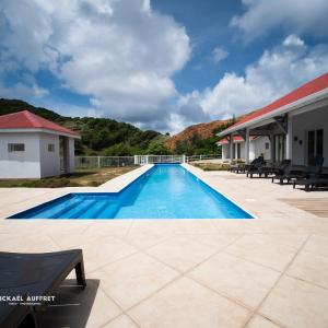 Grande villa avec piscine et jacuzzi, vue mer splendide, proche des plages de Grand Anse et de l'Anse Rodrigue, très calme, sans vis-à-vis