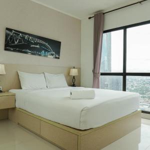 Modern Style 2BR at Tamansari Semanggi Apartment By Travelio