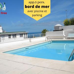 app Le Rocazur avec piscine et parking en bord de mer à 500M du centre ville