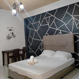 DJCI Apartelle Walk to Robinson & NE Pacific Mall 3 Min to SM Cabanatuan