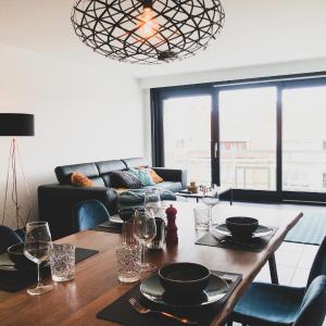"Cosy Dune", trendy en zuid gelegen ruim appartement op 100m van strand en winkelstraat