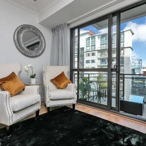 Sky Tower Serenity + Rooftop Pool